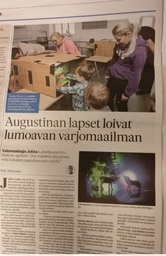 Forssan lehdessä juttu valotyöpajasta hoitajat lapsineen.