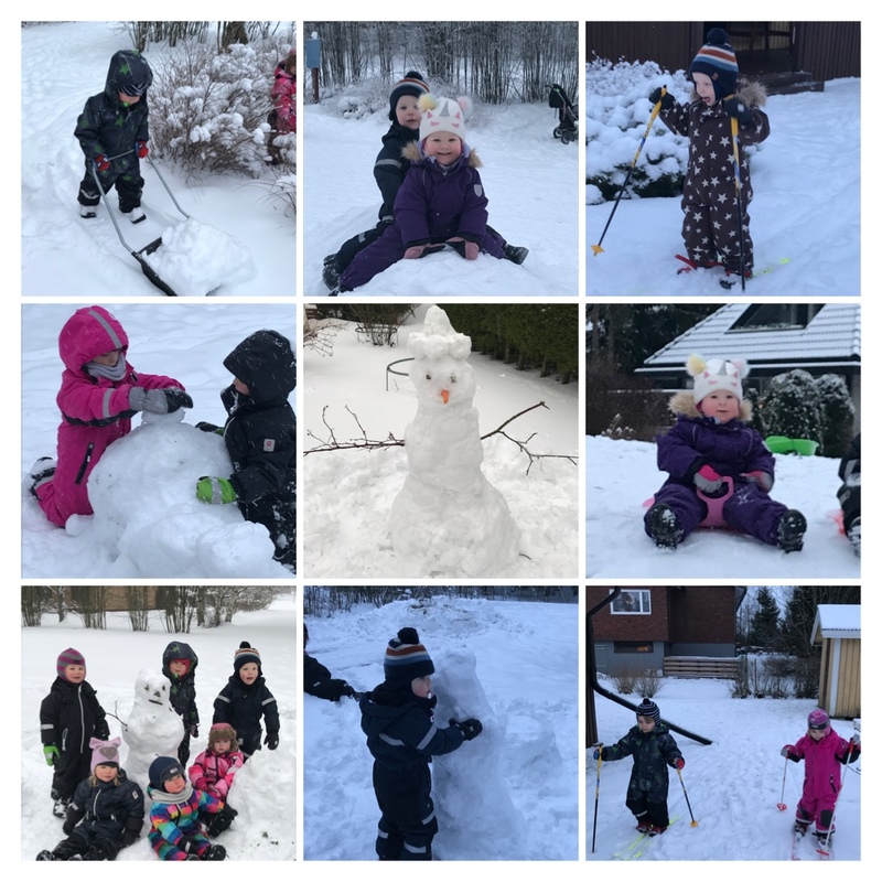 Lasten touhuja lumesta nauttien.