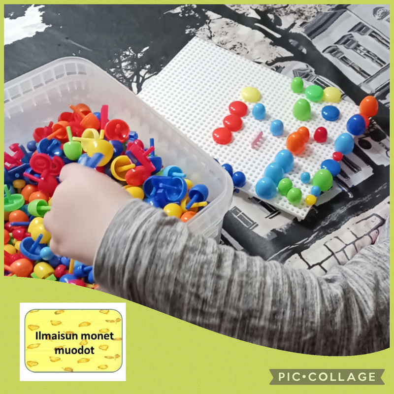 Lapsi tekee nuppitaulua