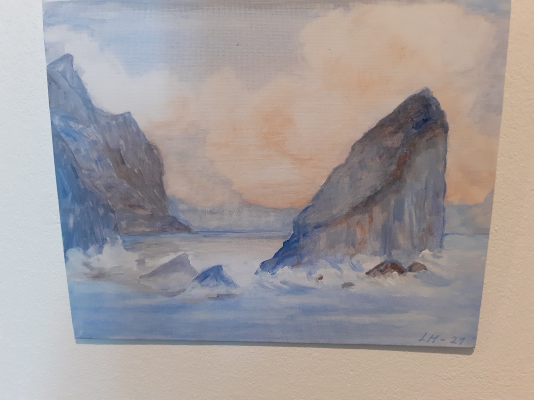 Kallionlohkareita merimaisemassa