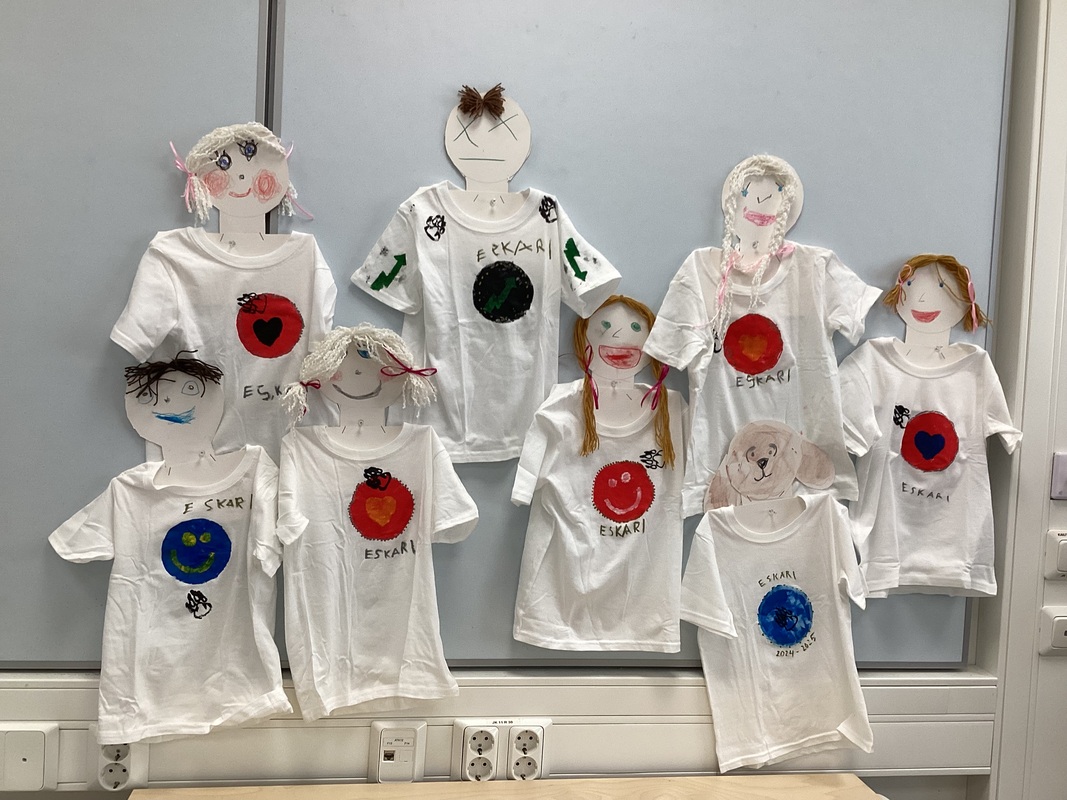 Eskaripaitoja painettiin...Taunolle hurraata huudettiin