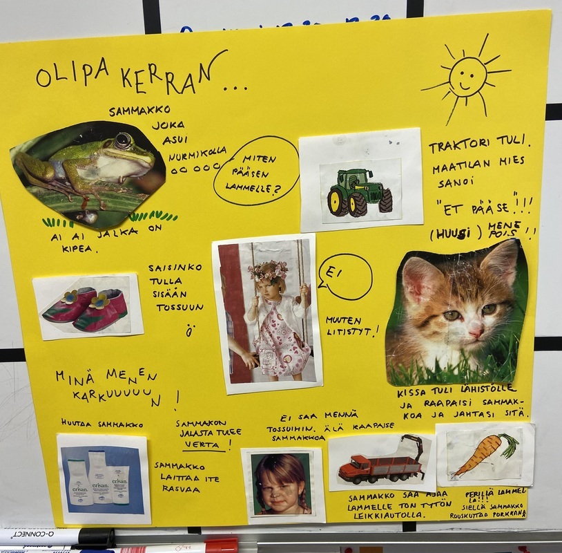 IMG_4436.jpeg Keltainen taustapaperi, jolle lapset ovat kirjoittaneet ja liimanneet kuvista oman sadun. Satu kertoo sammakosta, joka haluaa päästä lammelle.