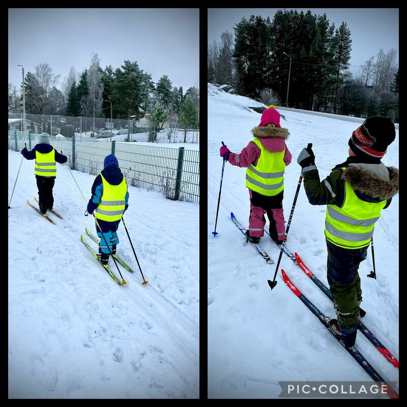 Kuvassa eskareita hiihtämässä
