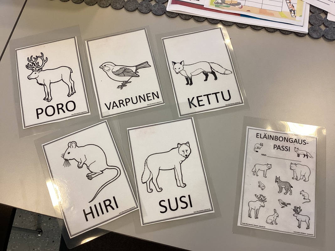 Pe 3.10. Lapset etsivät metsästä eläinrasteja