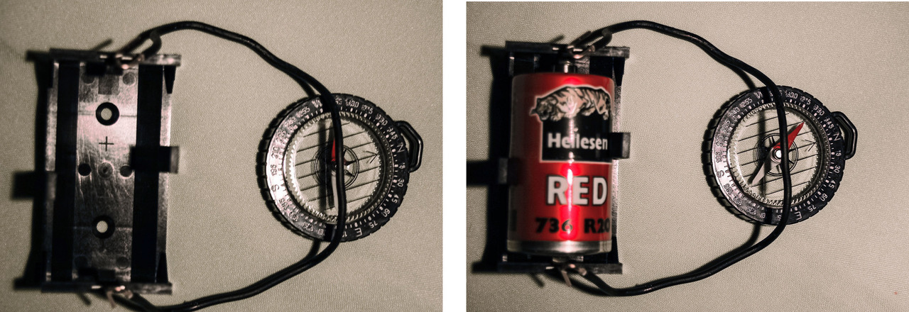 An electric circuit and a compass. When the circuit is closed, the conductor becomes an electromagnet. The permanent magnet of the compass, the needle, begins to turn away from the conductor.
