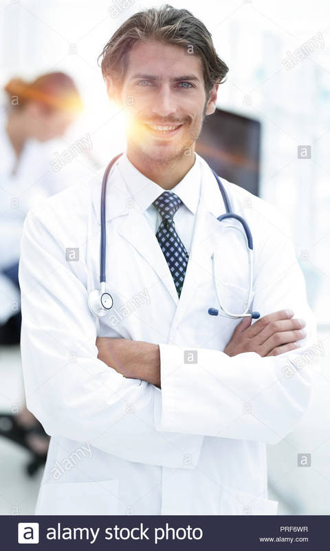 handsome-male-doctor-smiling-with-arms-crossed-on-chest-portrait-PRF6WR.jpg
