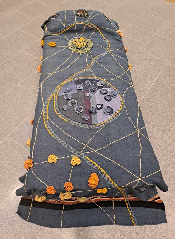 Kirjottu vanha peitto